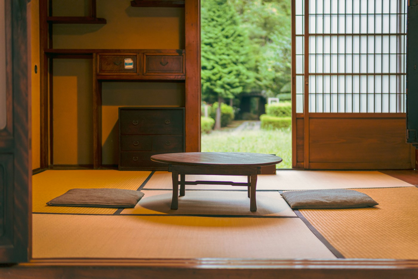 Restrained Japandi room with low furniture and natural textures